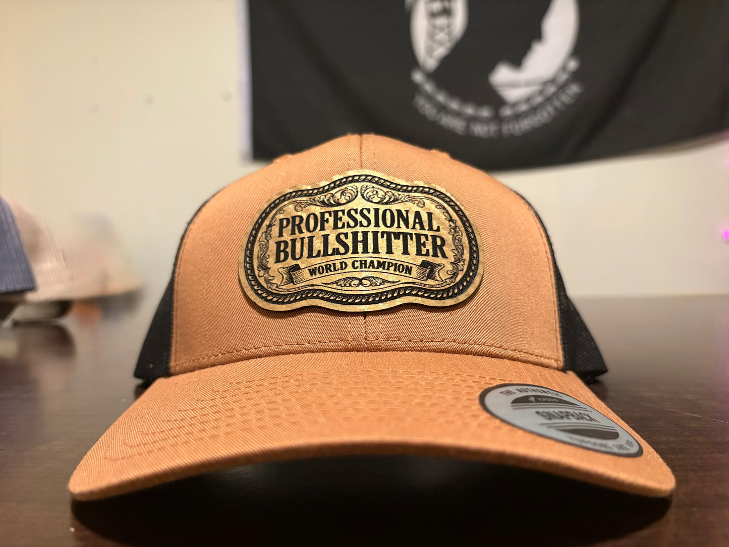Professional Bullshitter – World Champion Leather Patch Trucker Hat